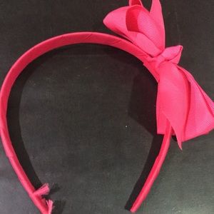 Bright pink bow headband